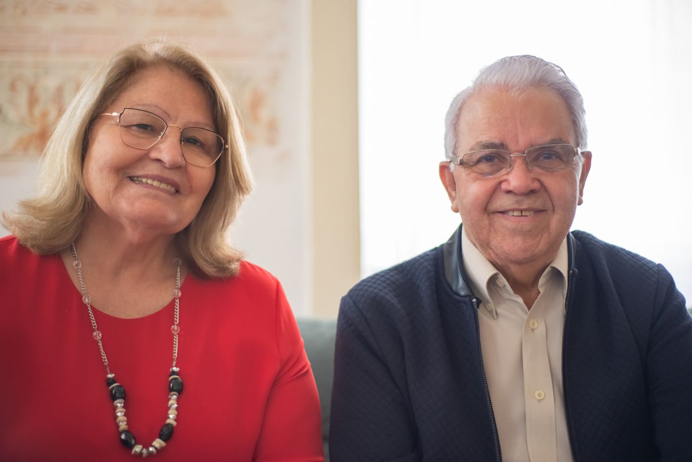 A senior couple touring a senior living community